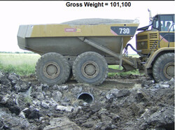 HP Storm Culvert under dump truck